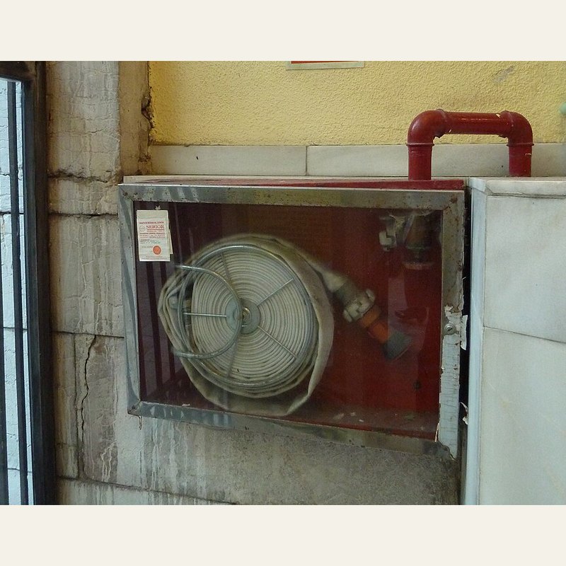 Fire hose reel with cabinet